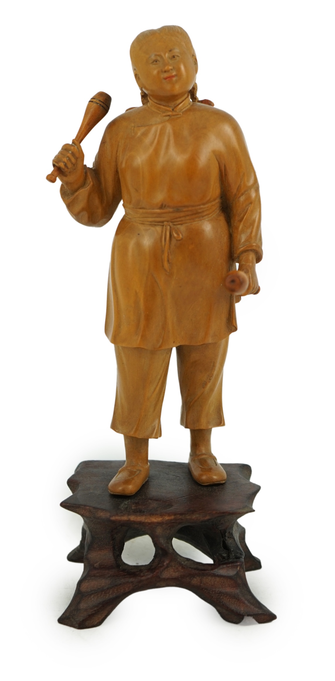 A Chinese boxwood figure of a female juggler, attributed to Zhu Zichang (1876-1934), Republic period